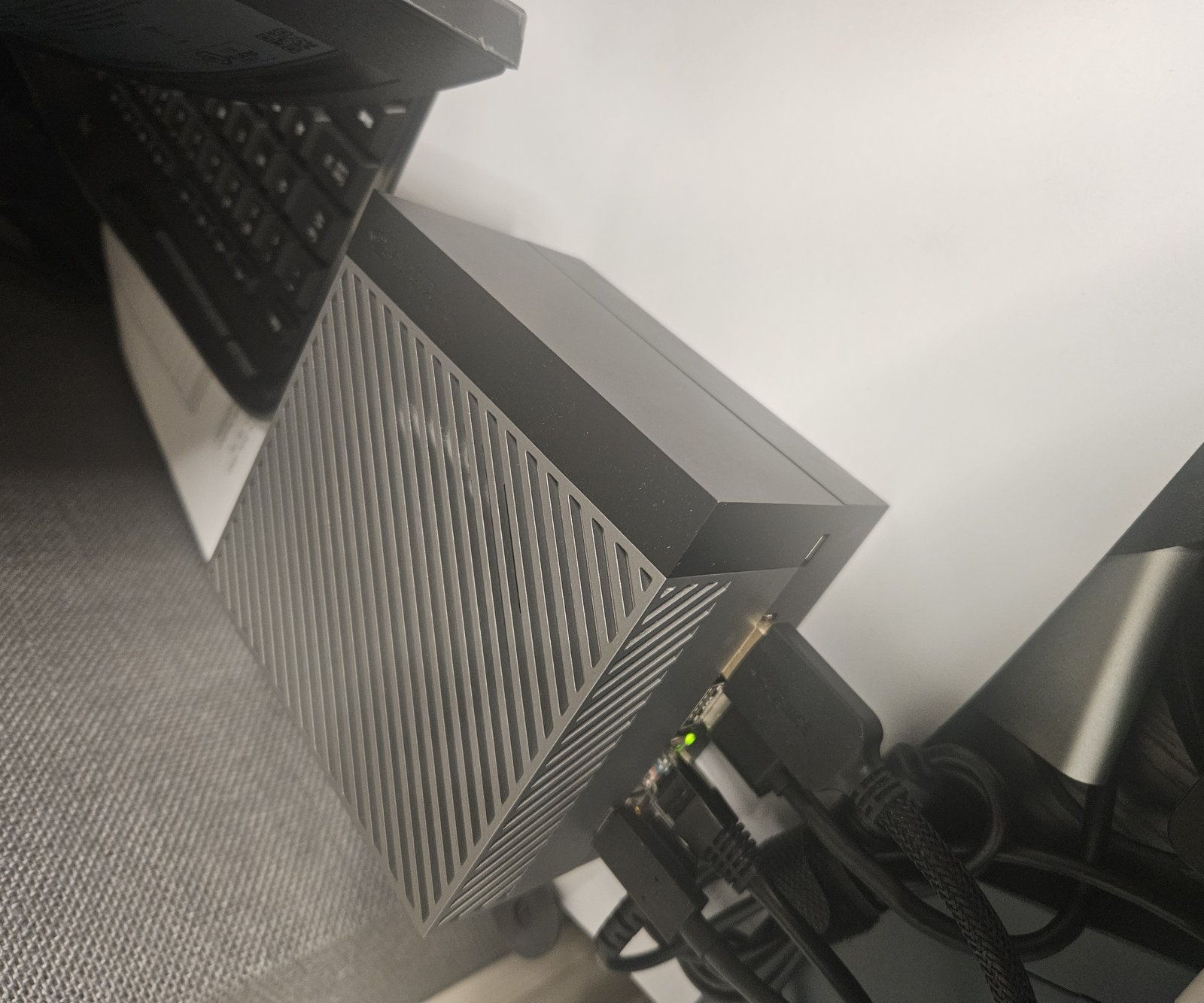 NVIDIA Jetson AGX Orin Developer Kit on a desk, cables connected.
